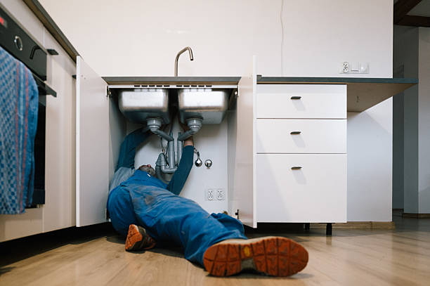 Professional Drain Cleaning technician working in Milan, IL